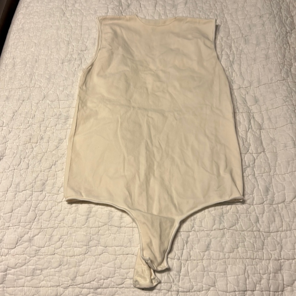SKIMs cream colored body suit. S/M. High neckline